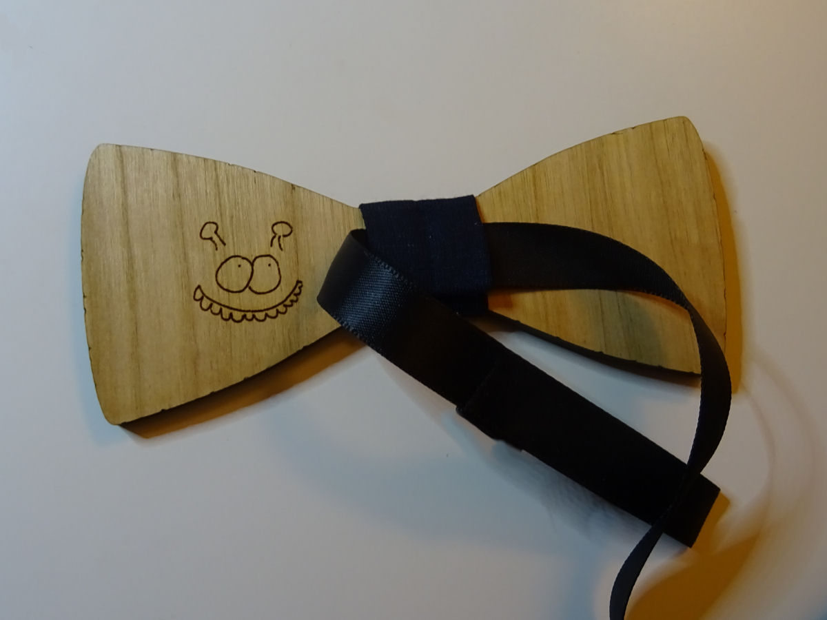 Drawing engraved on the back of a bow tie