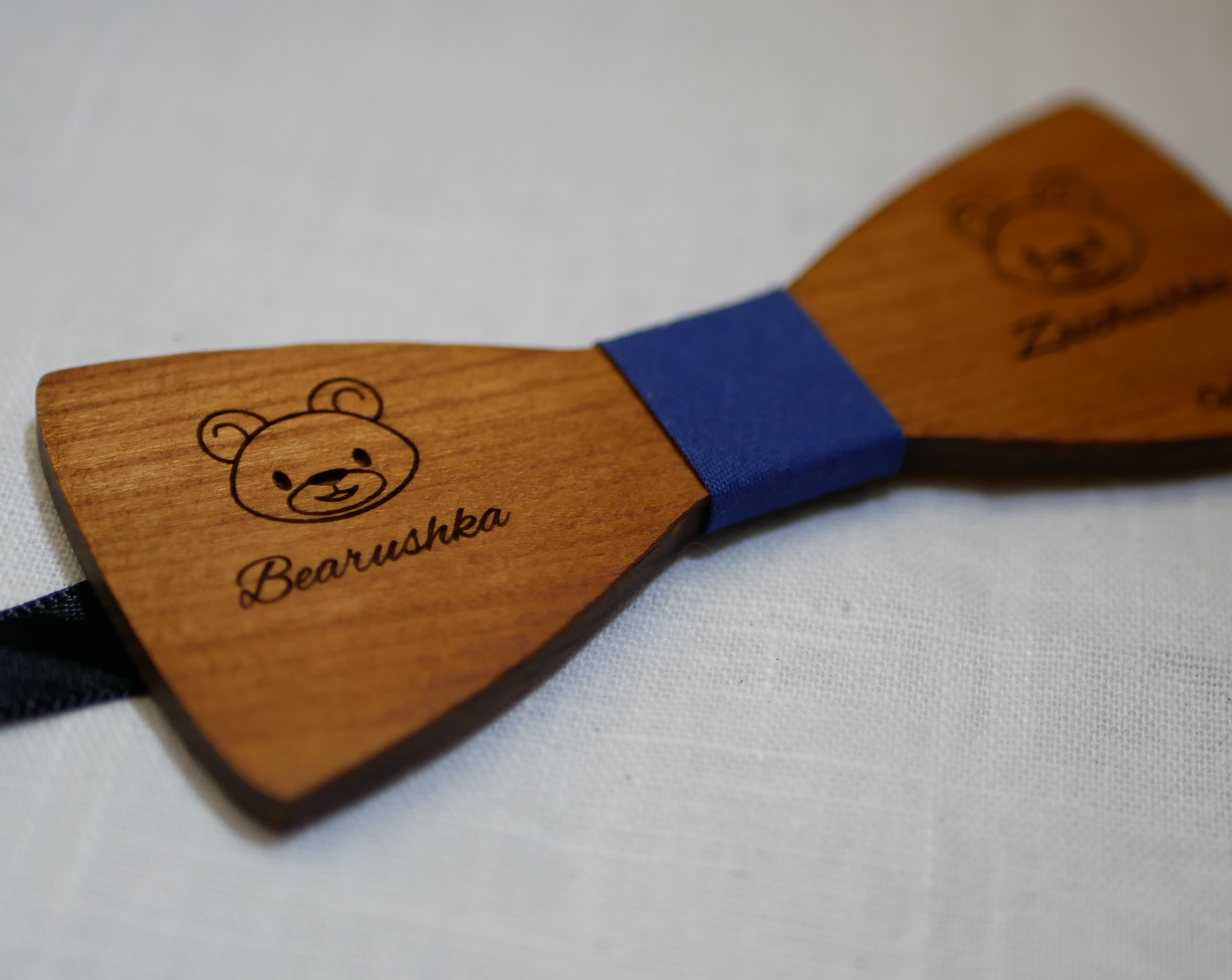 cherry wood bow tie with engraved design