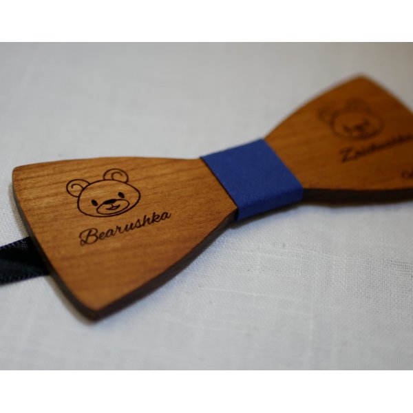 cherry wood bow tie with engraved design
