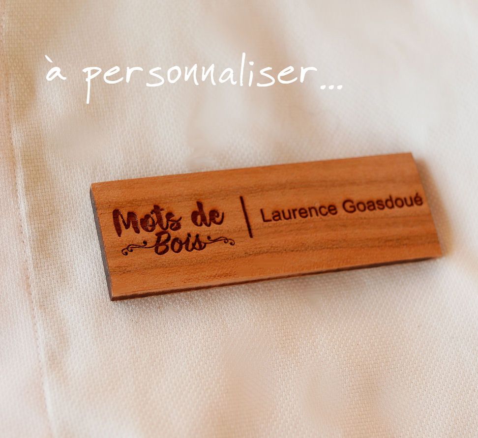 Wooden badge with company logo and name