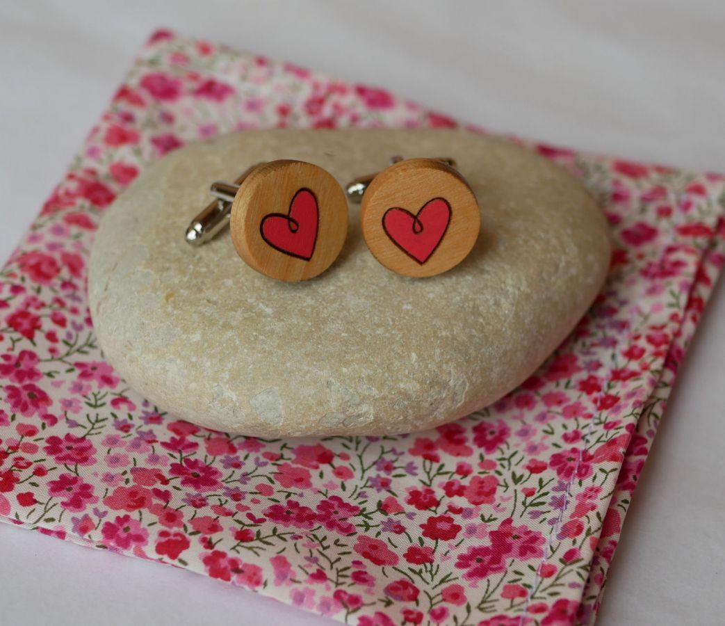 Wooden cufflinks with painted hearts