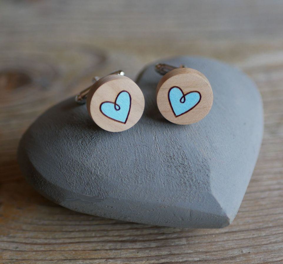 Wooden cufflinks with painted hearts