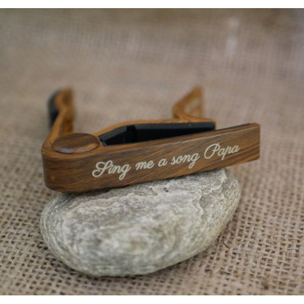 Aluminum guitar capo with gold engraving to personalize