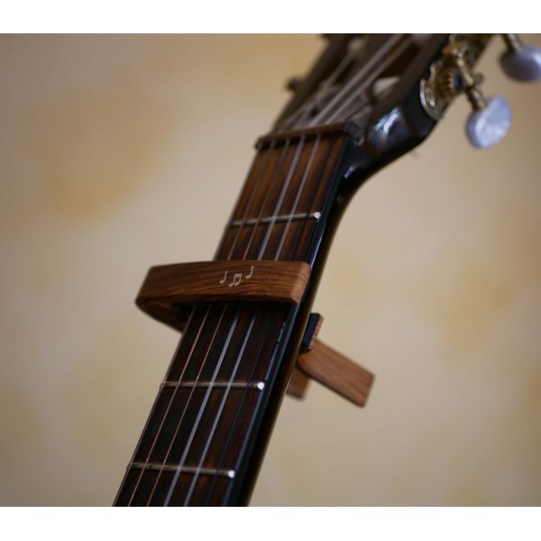 Aluminum guitar capo with gold engraving to personalize