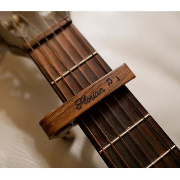 Engraved aluminum guitar capo to personalize