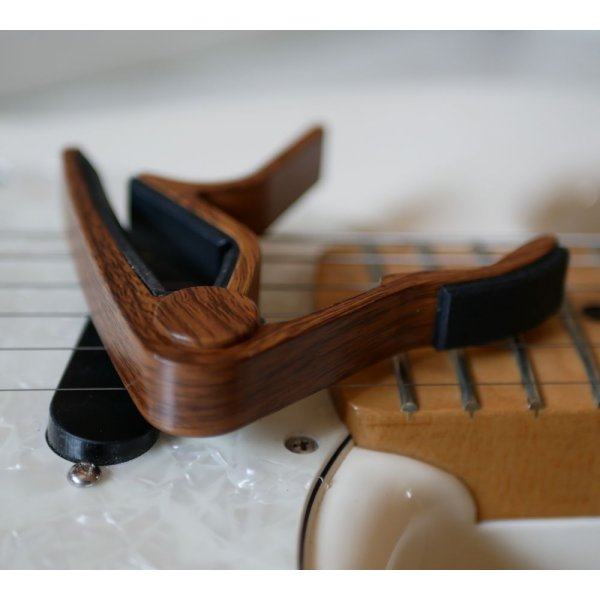 Aluminum guitar capo with gold engraving to personalize