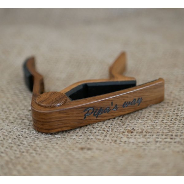 Engraved aluminum guitar capo to personalize