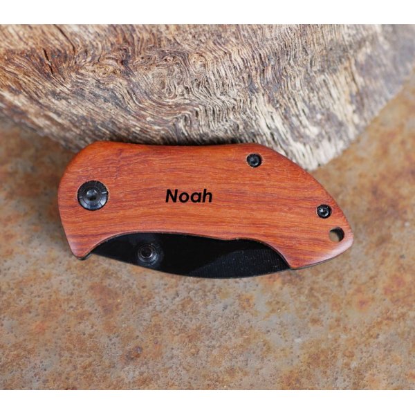 Small knife with wooden handle to engrave