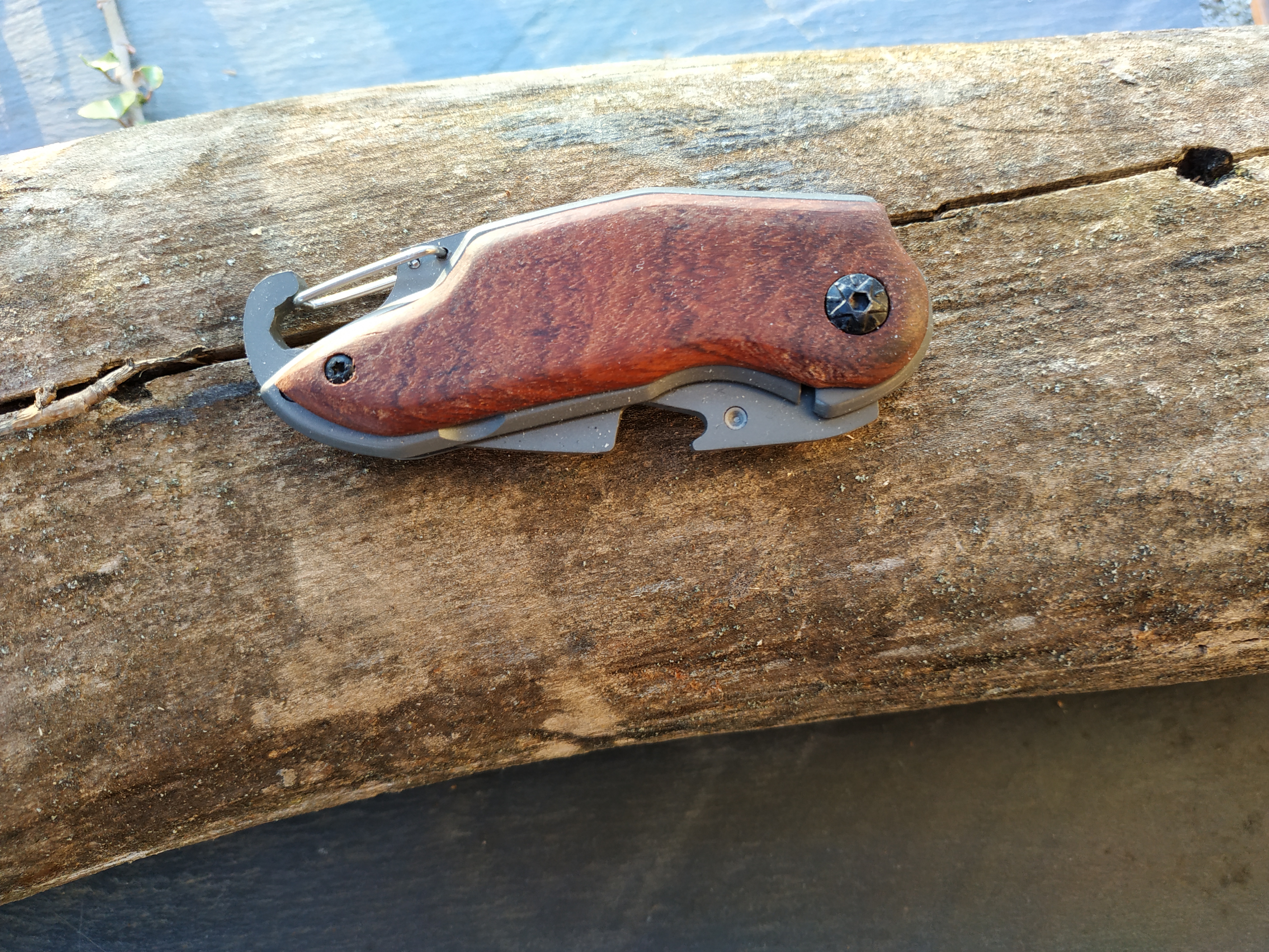 Folding pocket knife, wooden handle with engraving