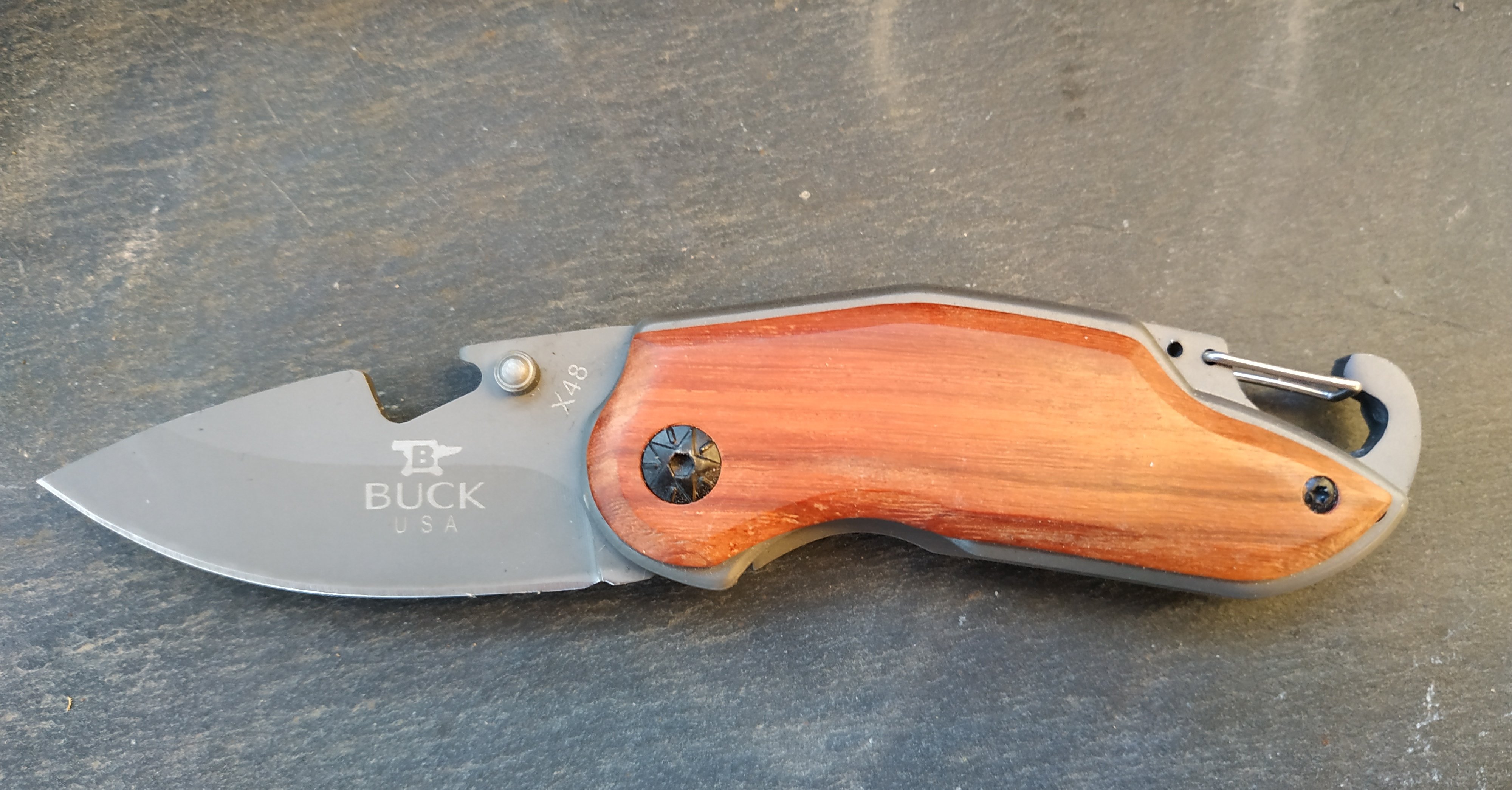 Folding pocket knife, wooden handle with engraving