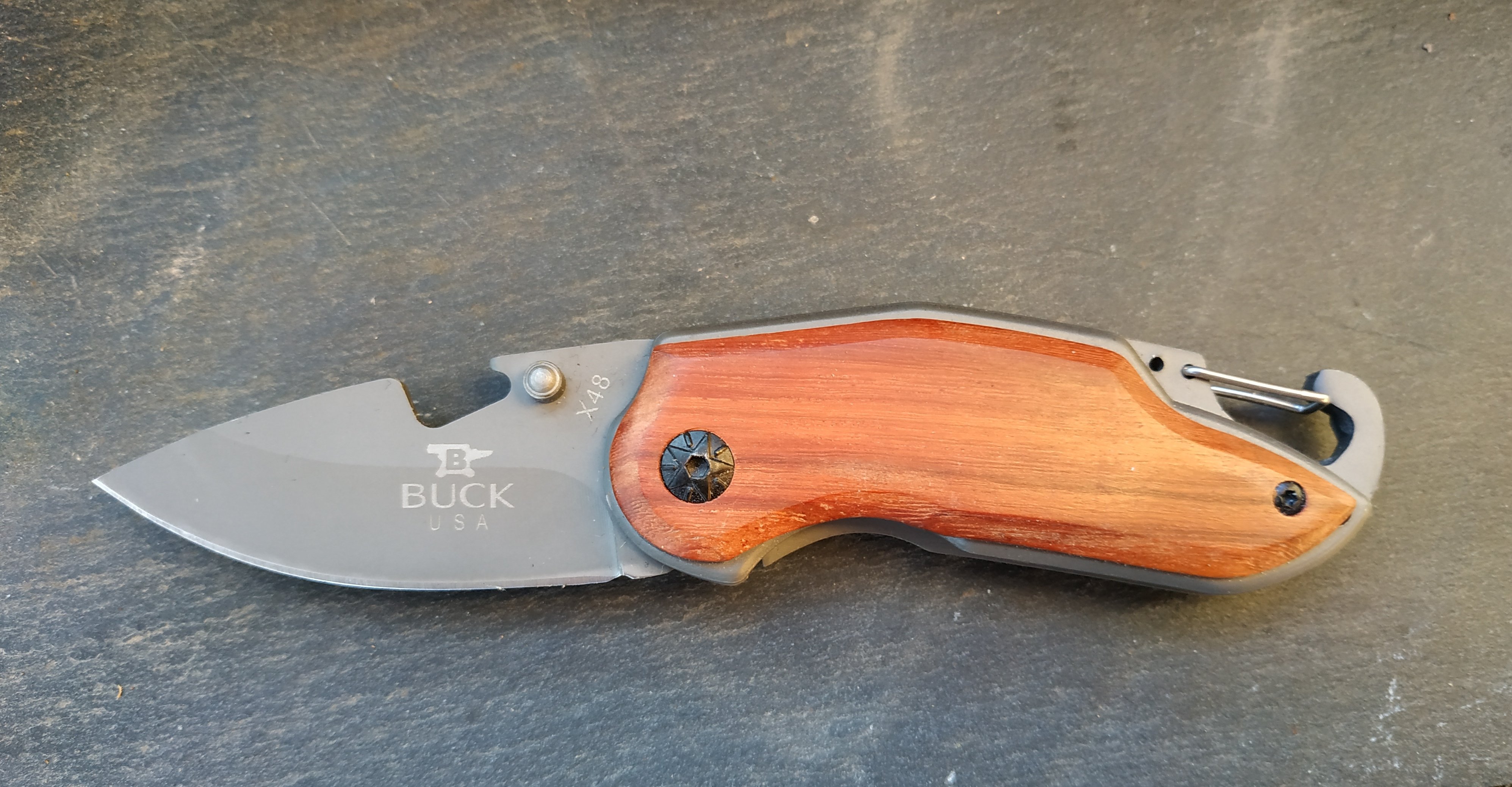 Folding pocket knife, wooden handle with engraving