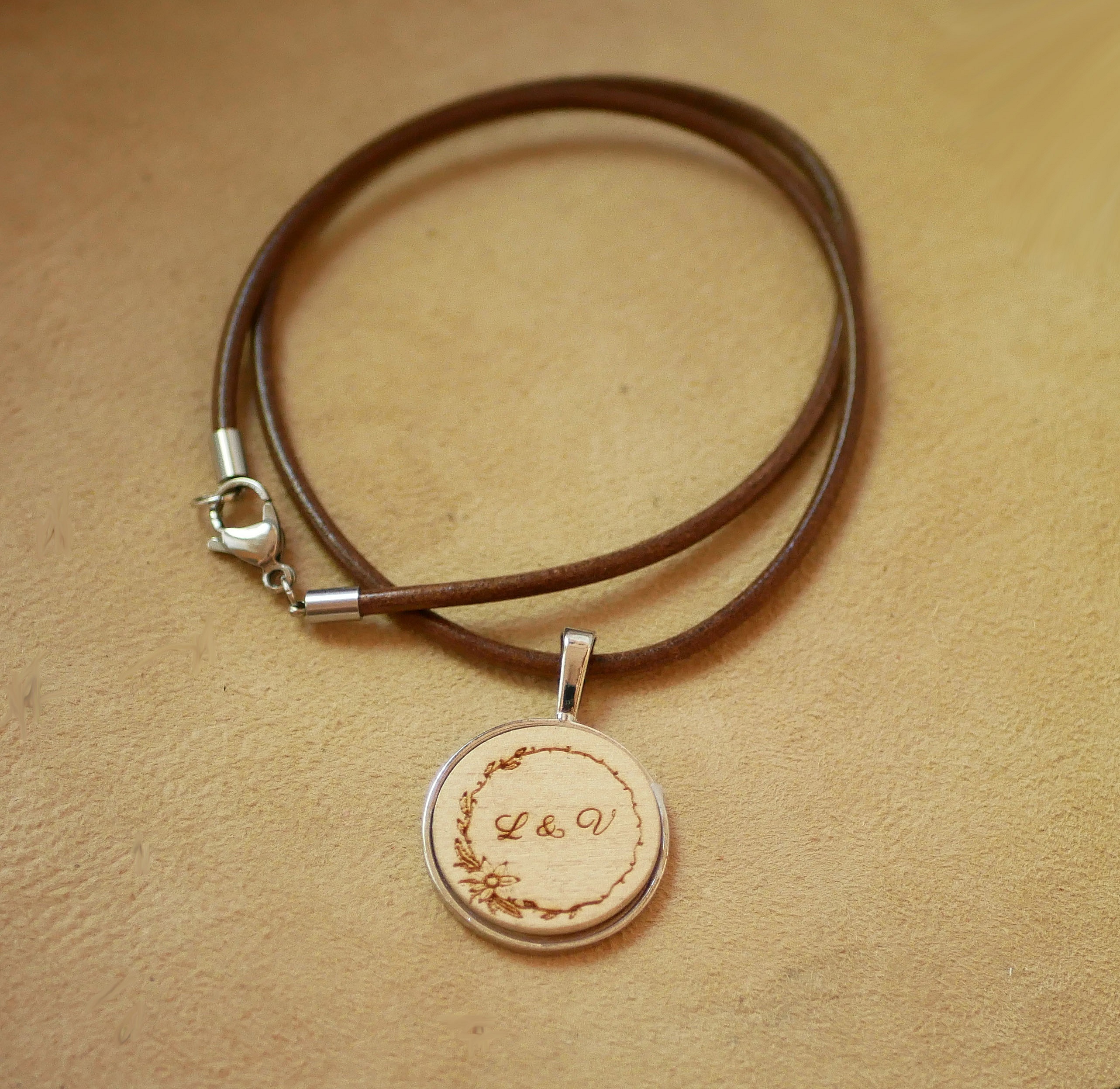 Engraved wooden medallion on European leather necklace to personalize 