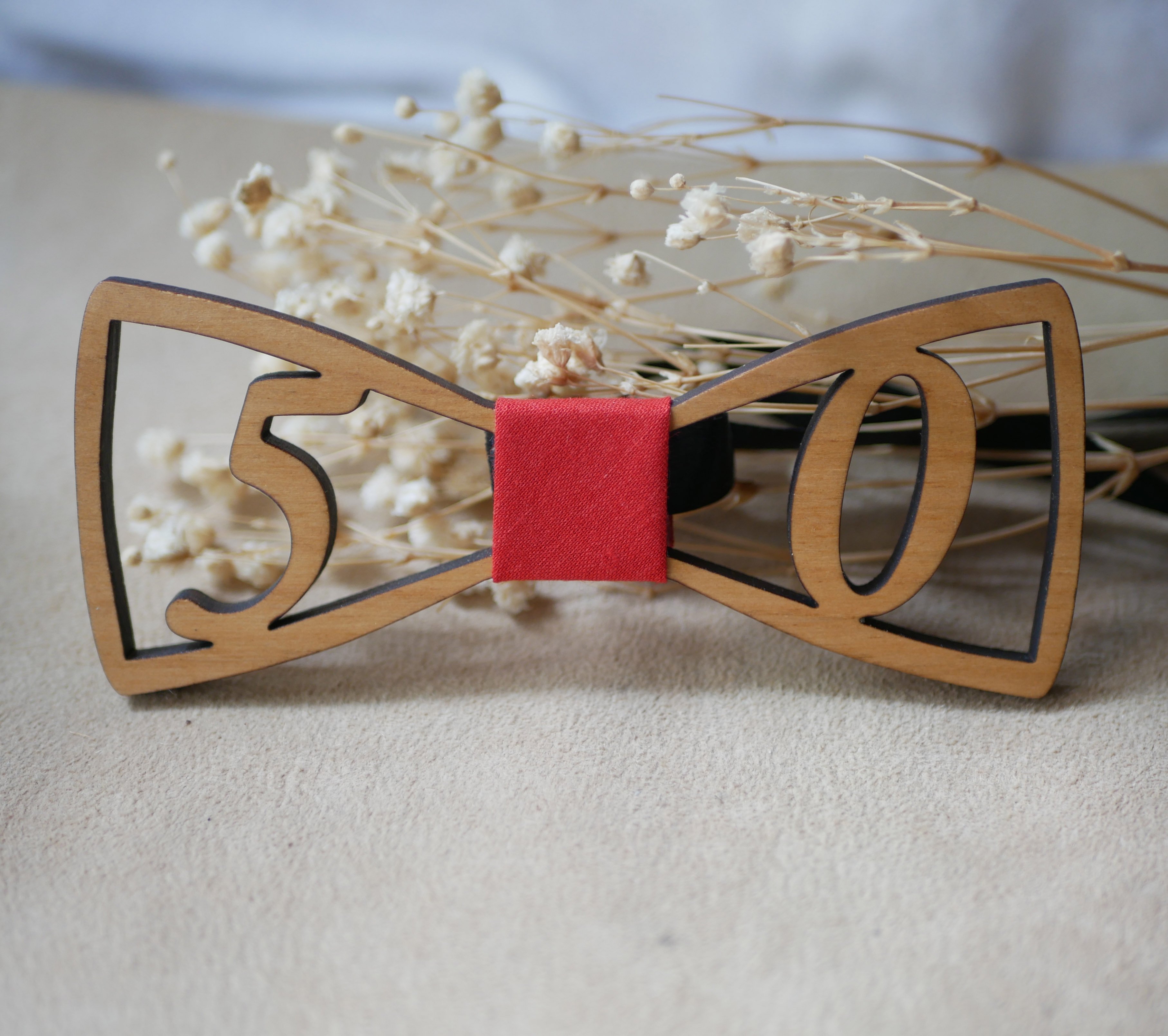 Wooden bow tie with openwork birthday numbers to personalize