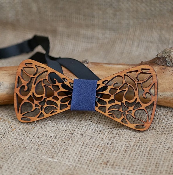 French wooden bow tie with hollowed out arabesques