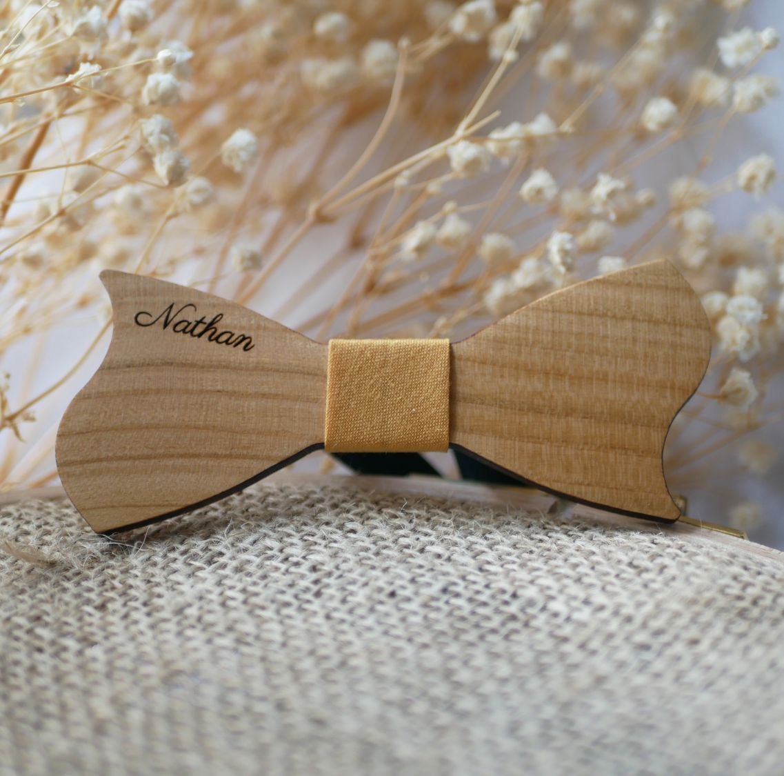 Asymmetrical cherry wood bow tie for children to personalize