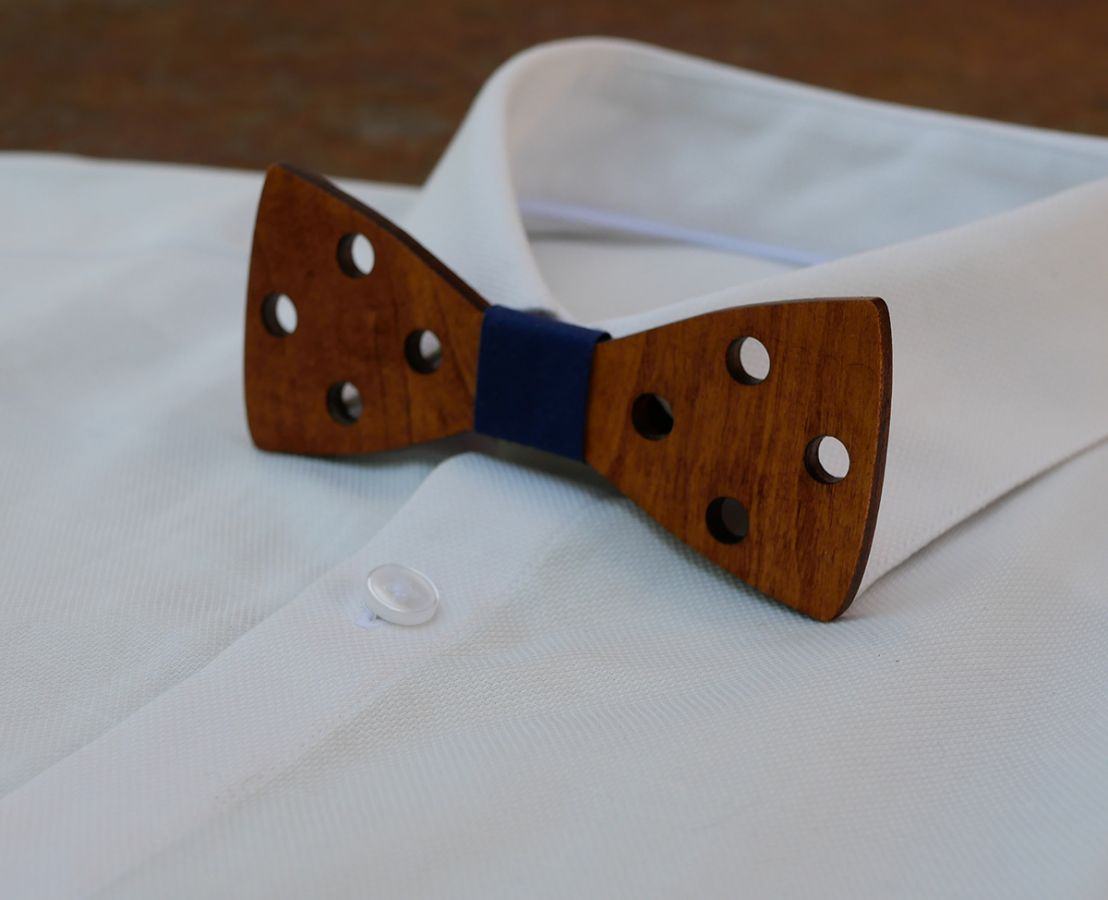 Engraved stained wood bow tie with holes to personalize