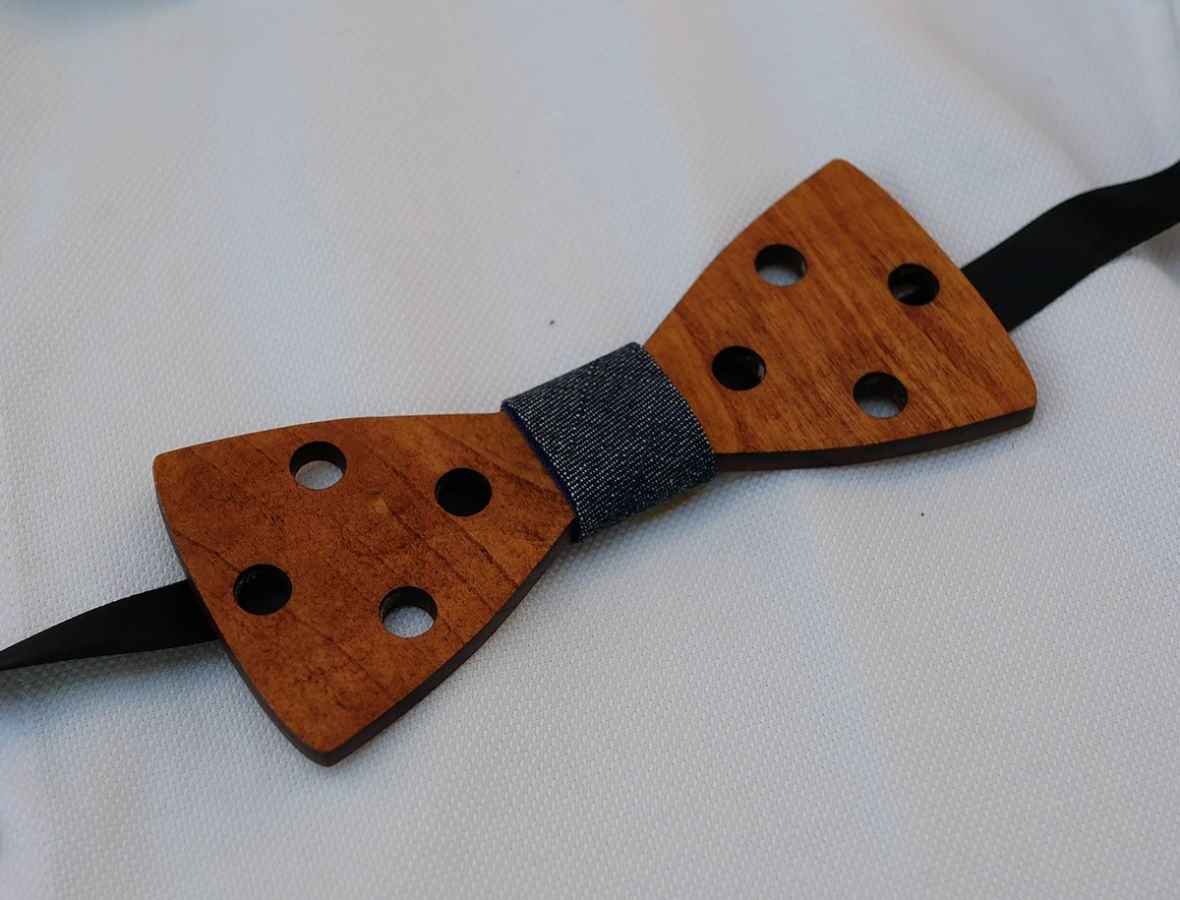 Engraved stained wood bow tie with holes to personalize