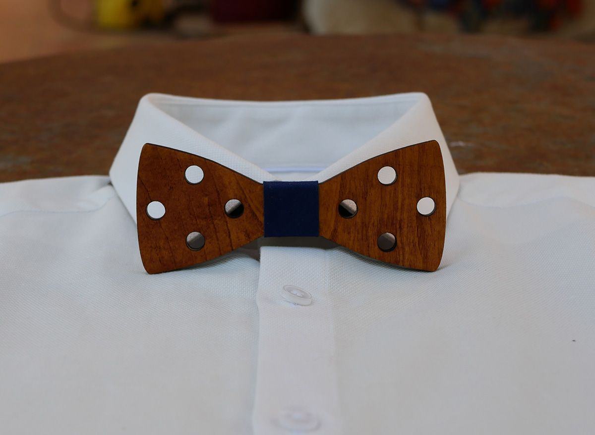 Engraved stained wood bow tie with holes to personalize