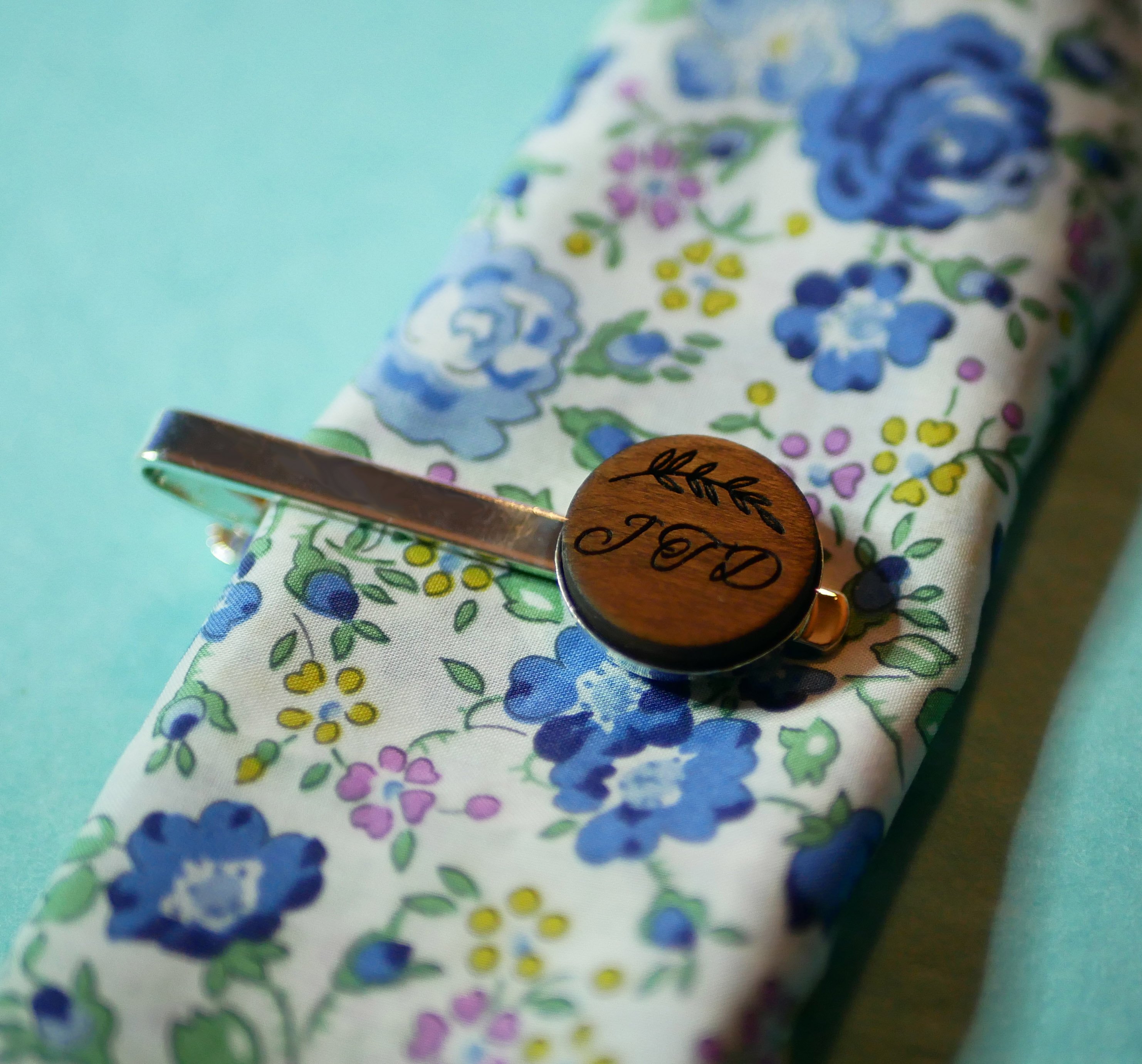 Wooden tie clip with engraved wood cabochon