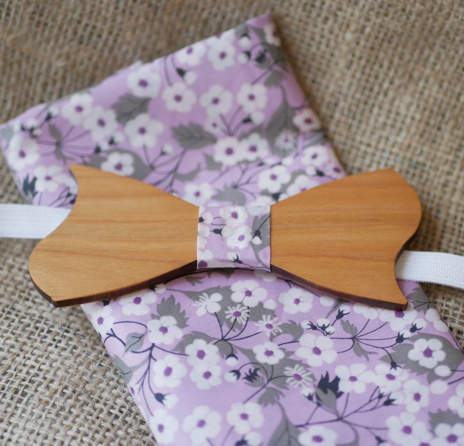 Liberty Mitsi clutch bag with purple flowers and wooden bow tie