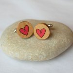 Wooden cufflinks with painted hearts